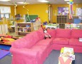Playgroup room designs for brainy child: Imaginative playgroup room designs with pink sofa