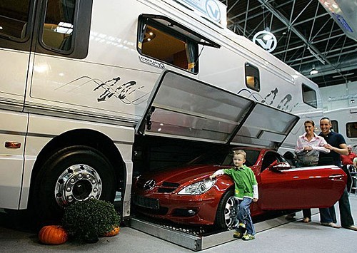 Mobile home with modern and contemporary interior designs: luxury freightliner motorhome with car garage