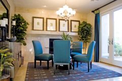 Contemporary Glass Top Dining Table With Soft Blue Single Soffa With Luxury Nuance 600x414 1 Scaled
