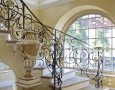 Modern Staircase Designs for Homes: modern spiral staircases with leaf plant pattern iron banister decoration