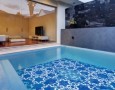 Outdoor private swimming pool design and the consideration: adorable mosaic outdoor swimming pool design idea
