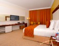Stylish Auris Plaza Hotel with The Modern Interior Design Gallery: Beautiful Classic Room with tv cable facilities and two large mirror decoration in Auris Plaza Hotel