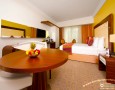 Stylish Auris Plaza Hotel with The Modern Interior Design Gallery: Contemporary bedroom design for hotel with master bed litle dining table and make up table also cabinet