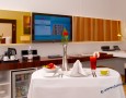 Stylish Auris Plaza Hotel with The Modern Interior Design Gallery: Neat Bedroom arrangement for breakfast coffee and refrigerator and simple work table